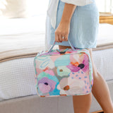 Hanging Toiletry Bag in design Fleur by artist Jade Fisher