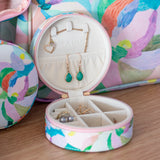Travel jewellery case with adjustable compartments to avoid tangled necklaces, in colourful pastel design by Australian artist, Jade Fisher.