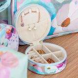 Travel jewellery case with adjustable compartments to avoid tangled necklaces, in colourful pastel design by Australian artist, Jade Fisher.