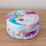 Travel jewellery case with adjustable compartments to avoid tangled necklaces, in colourful pastel design by Australian artist, Jade Fisher.