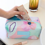 Spacious cosmetic makeup bag in box-shape, with design by Australian artist Jade fisher - from the Fleur collection.