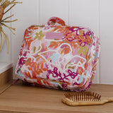 Hanging Toiletry Bag by Mindful Marlo in Ivy design, closed on benchtop