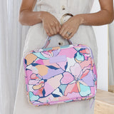 Hanging Toiletry Bag by Mindful Marlo in Willow design carrying by handles