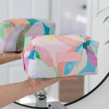 Spacious cosmetic makeup bag in box-shape, with colourful pastel design by Australian artist Jade fisher - from the Romy collection.